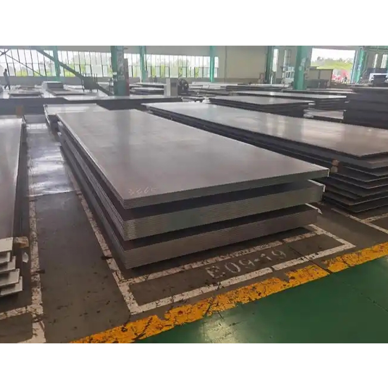 Why is common carbon steel plate still the most widely used structural material in construction, bridges, and shipbuilding?